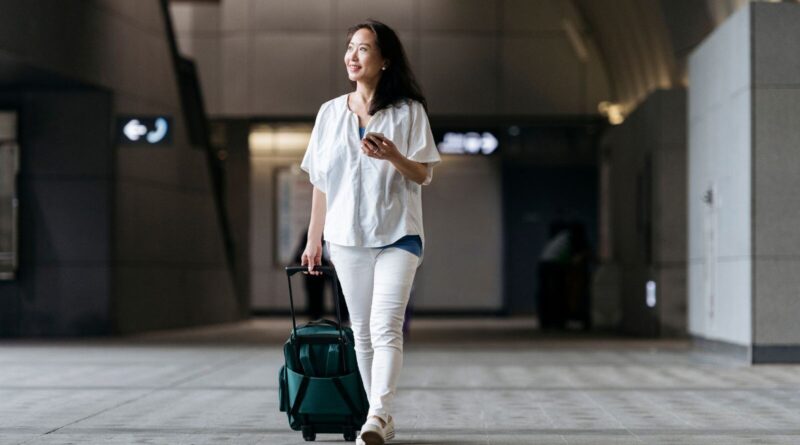 Woman with Luggage bag in airport